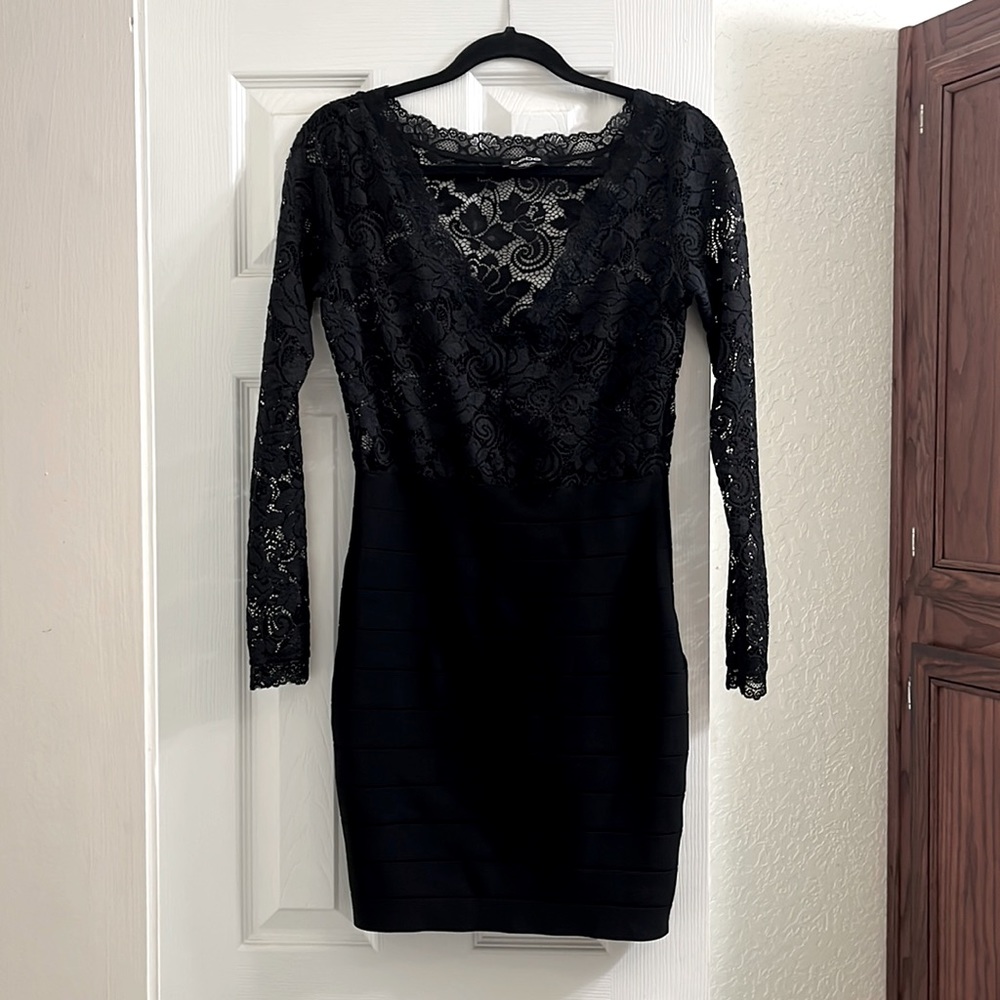 Bebe, large, black, top is see thru . Worn once. Like new